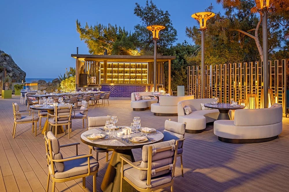 NG Phaselis Bay — Scallops bar terrace at dusk